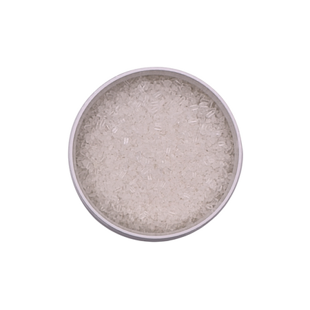 Silver-colored powder in a round container on a white background